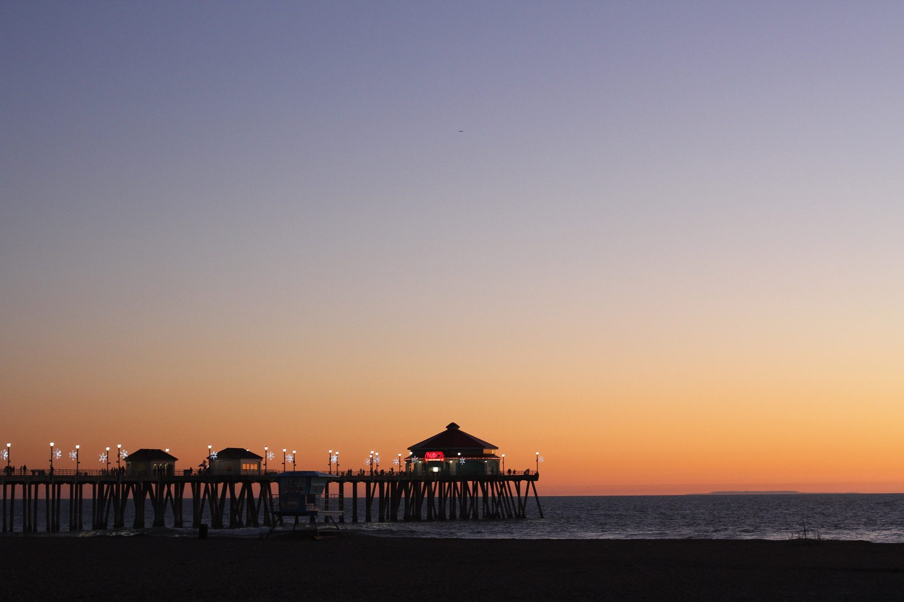 Sunset behind the Huntington Beach pier